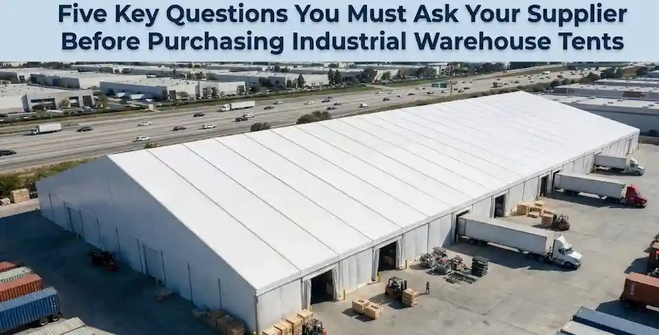 Large clear span industrial warehouse tent with forklifts and logistics trucks.