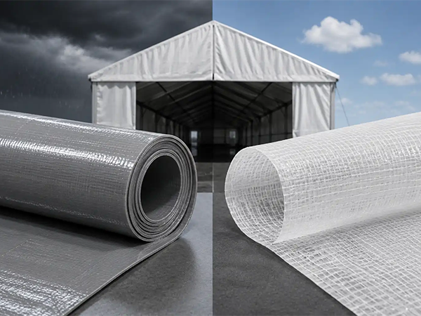 Grey and white PVC rolls showing weather resistance of aluminum clear span tents.